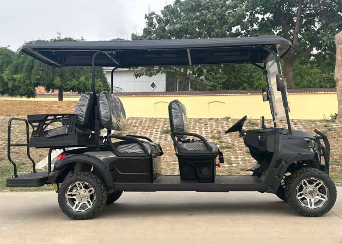 electric golf cart parked beside an RV park charging and parking zone