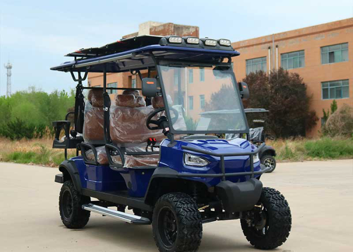 electric golf cart parked near a gatehouse and patrol staging area
