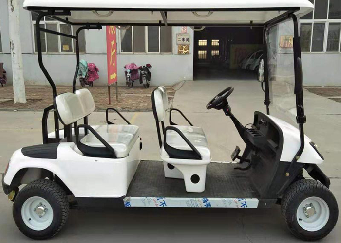 electric golf cart staged after trailer loading and site access planning review